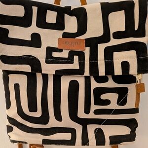 Ubuntu Life Black and Cream Patterned Backpack
